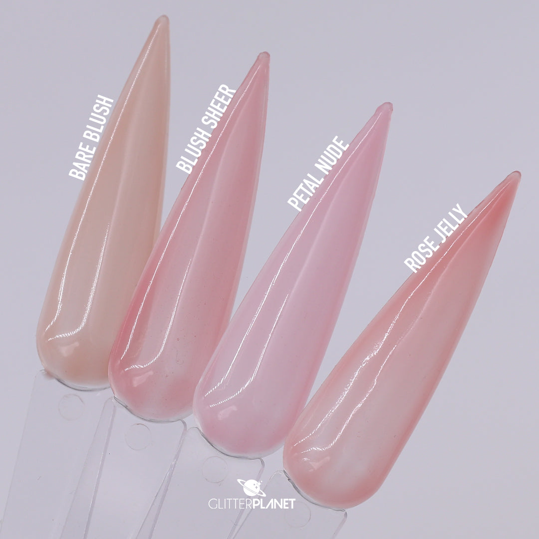 Four glossy stiletto nail tips in pale pink shades labeled Bare Blush, Blush Sheer, Petal Nude, and Rose Jelly, arranged on a light gray background with the brand name Glitter Planet at the bottom.