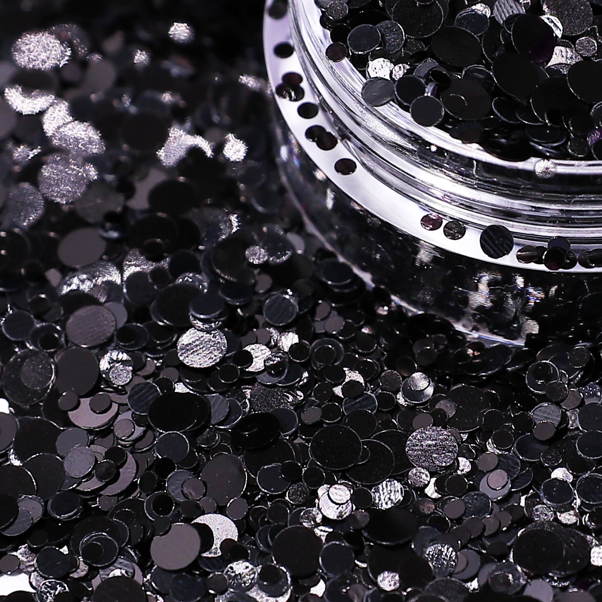Black dot glitter on with a clear container.