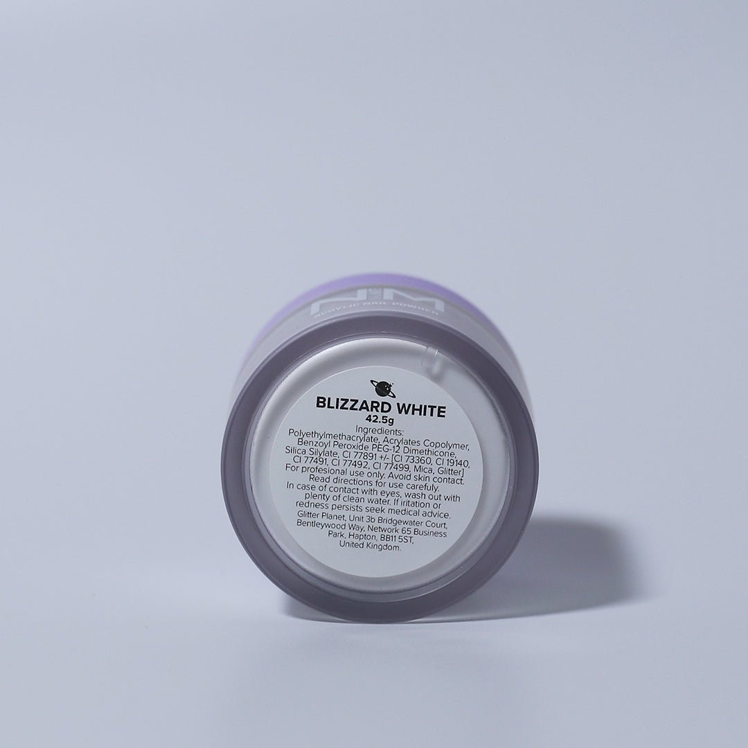 A jar of white acrylic nail powder with nail mate logo in white with a matte finish lilac lid. the jar in on a white backdrop the jar is on its side revealing the ingredients label on the bottom of the jar