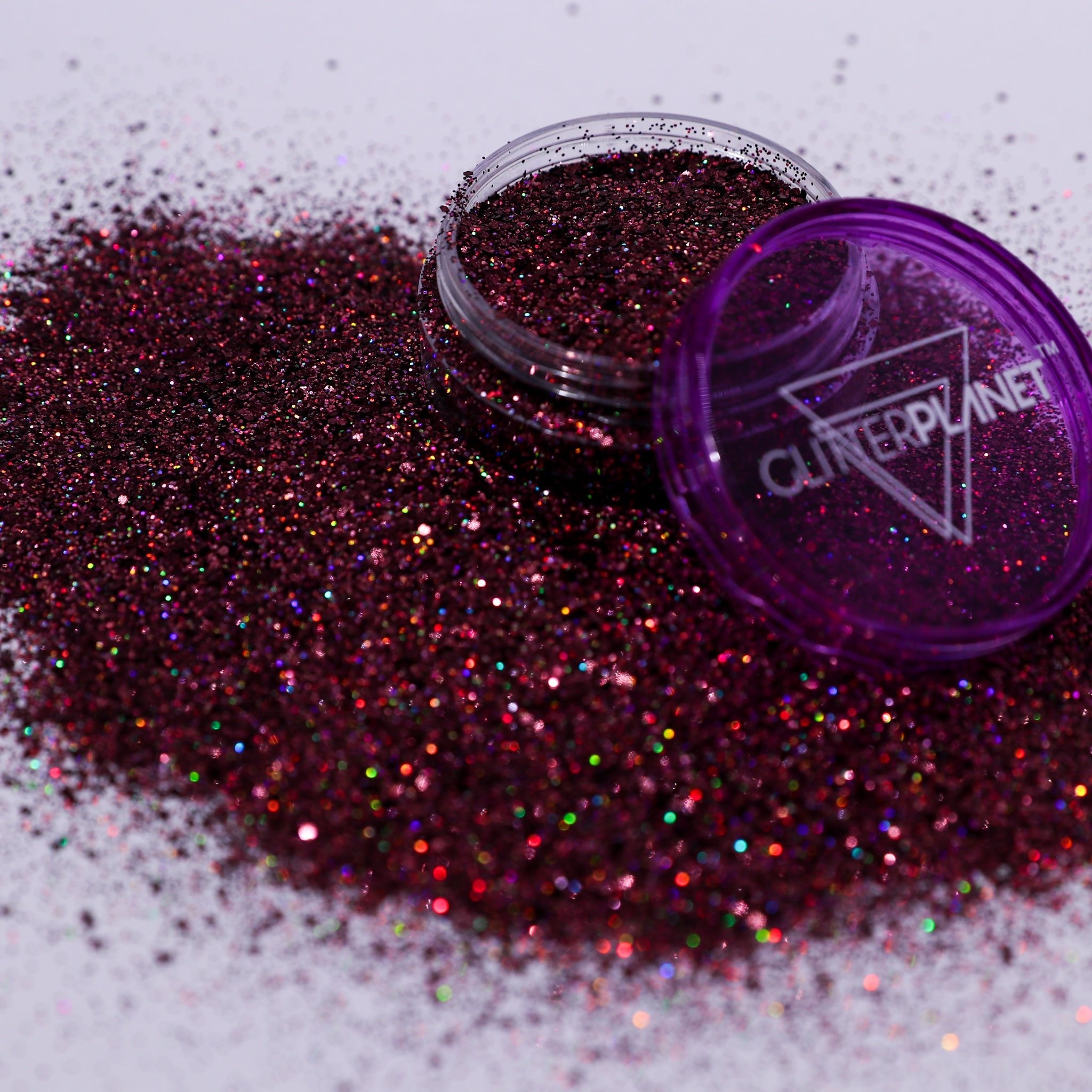 Purple glitter with a container labeled &