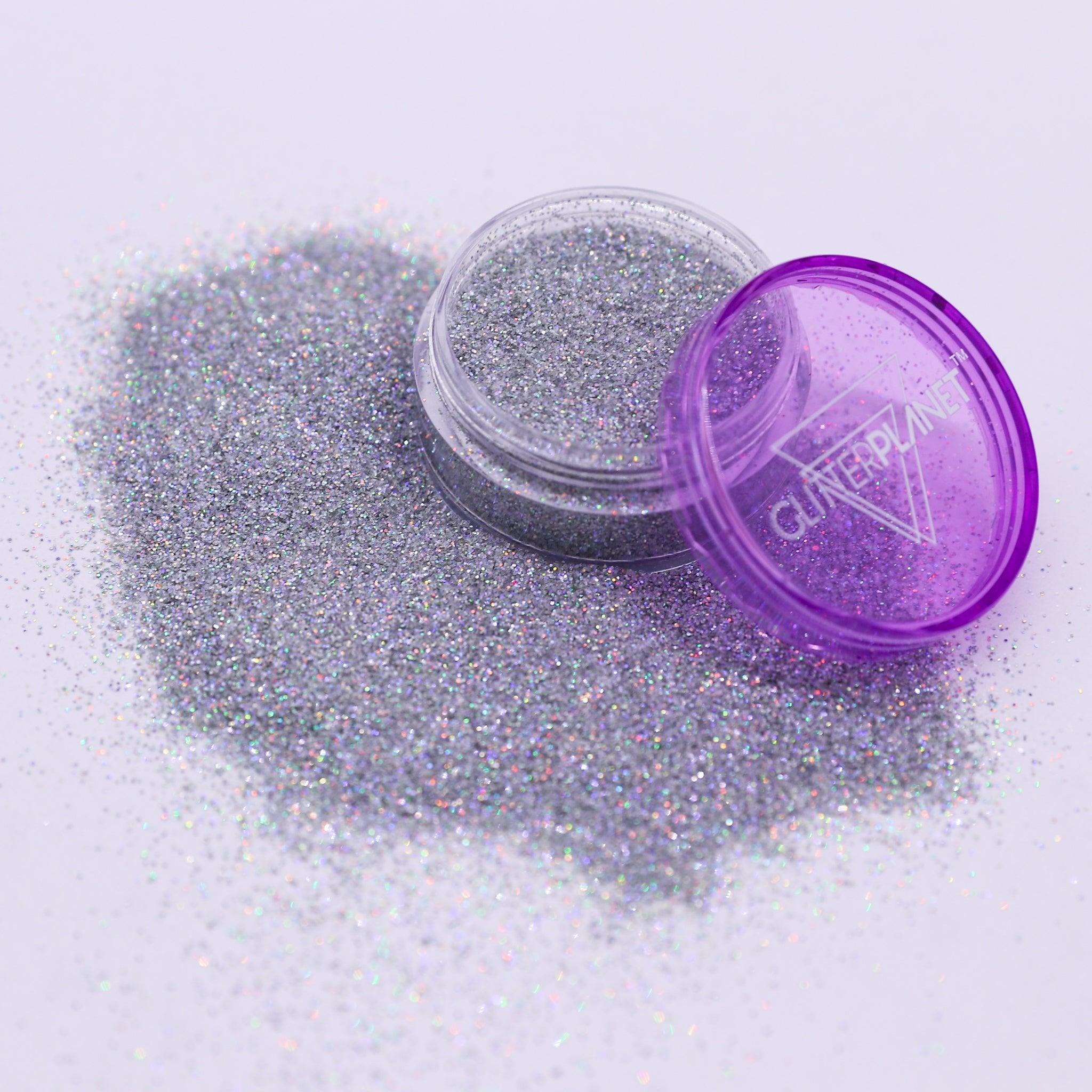 Silver glitter with a purple container on a light gray background | Glitter Planet