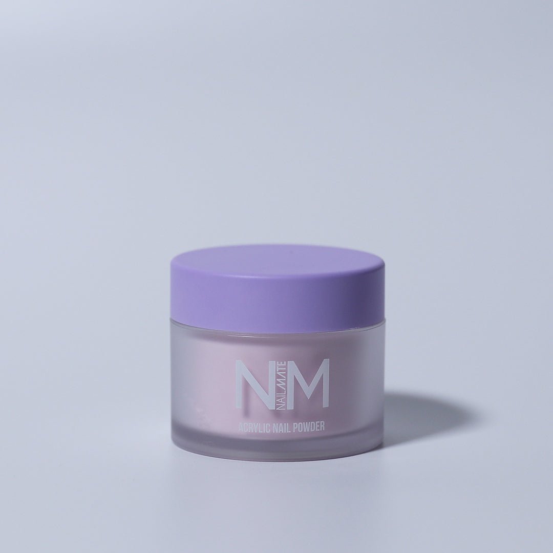 A closed container of Milky Pink acrylic nail powder with a purple lid, labeled NM, against a light background.