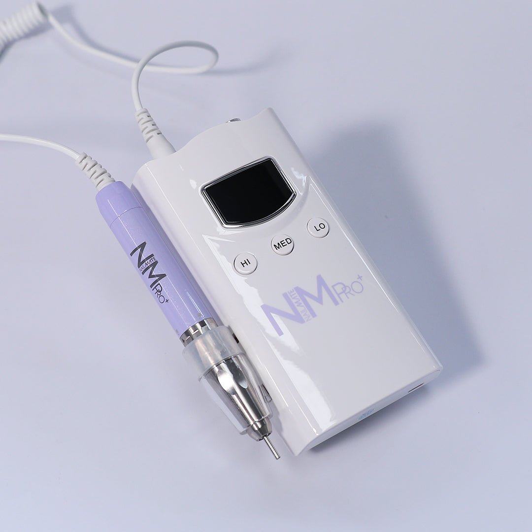 A white rechargeable nail drill machine with a lilac hand piece, designed for professional nail care. The machine features a compact design, with a digital display and control buttons on the front, showcasing its sleek appearance on a soft white background. it has speeds of 35,000 rpm and a torque of 4.8