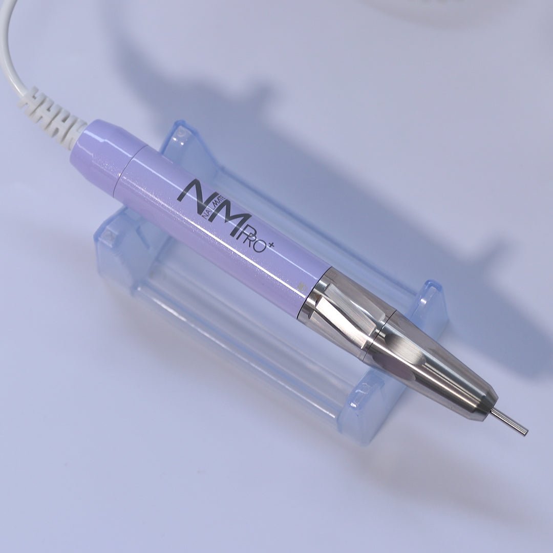 A white rechargeable nail drill machine with a lilac hand piece, designed for professional nail care. The machine features a compact design, with a digital display and control buttons on the front, showcasing its sleek appearance on a soft white background. it has speeds of 35,000 rpm and a torque of 4.8