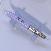 A white rechargeable nail drill machine with a lilac hand piece, designed for professional nail care. The machine features a compact design, with a digital display and control buttons on the front, showcasing its sleek appearance on a soft white background. it has speeds of 35,000 rpm and a torque of 4.8