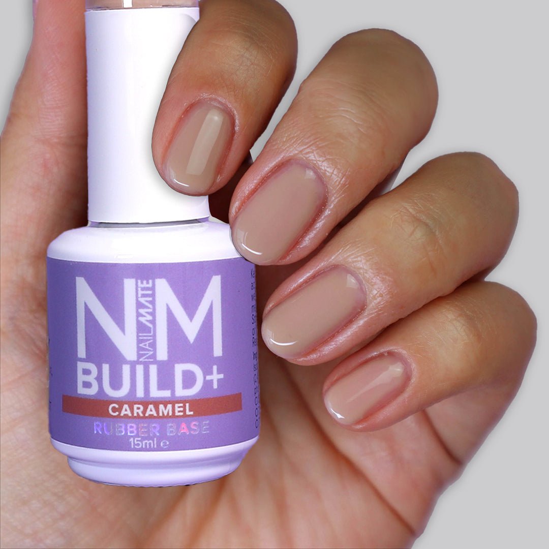 NM BUILD+ Builder Gel displayed in the bottle and painted on the fingers