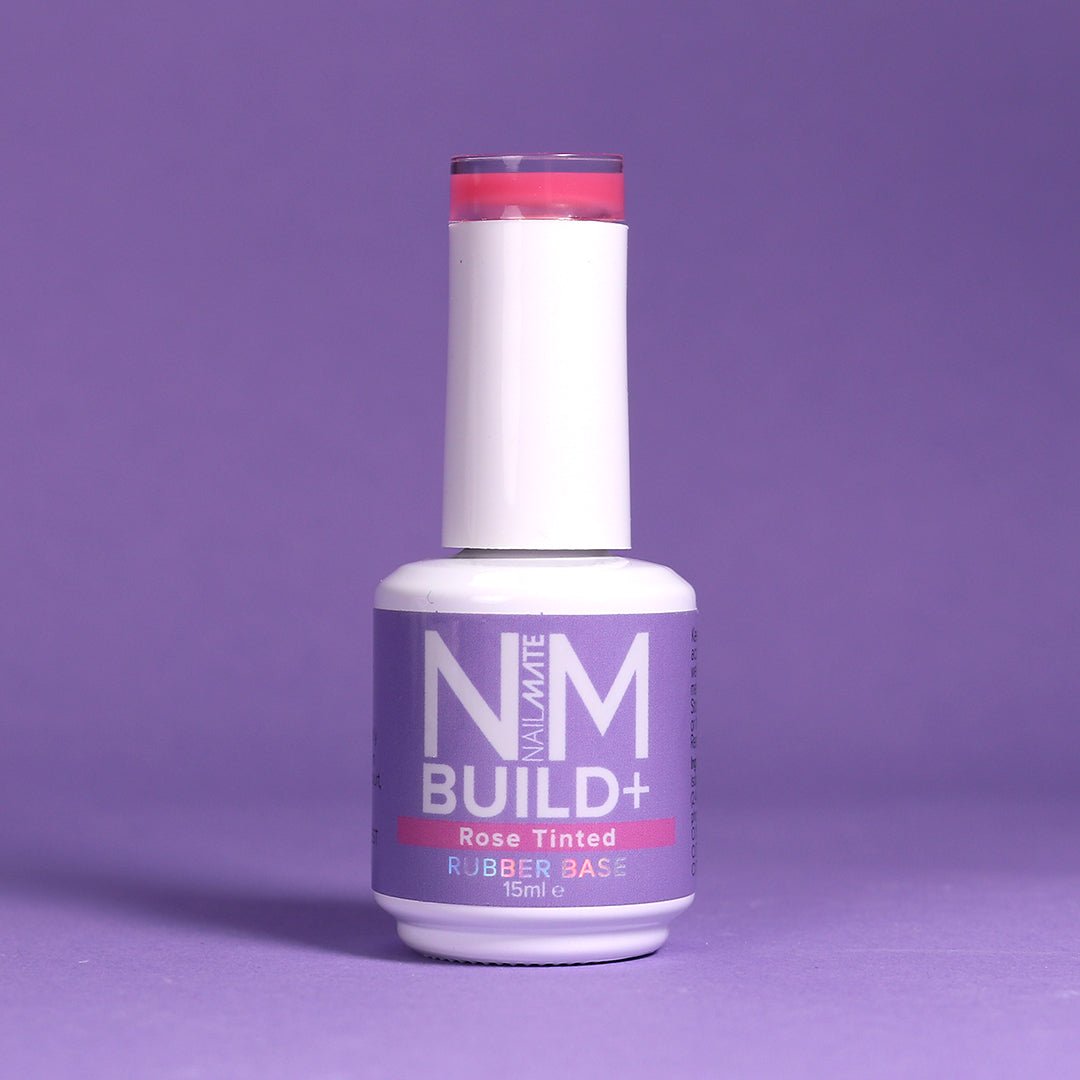 NM BUILD+ Builder Gel displayed in the bottle - rose tinted