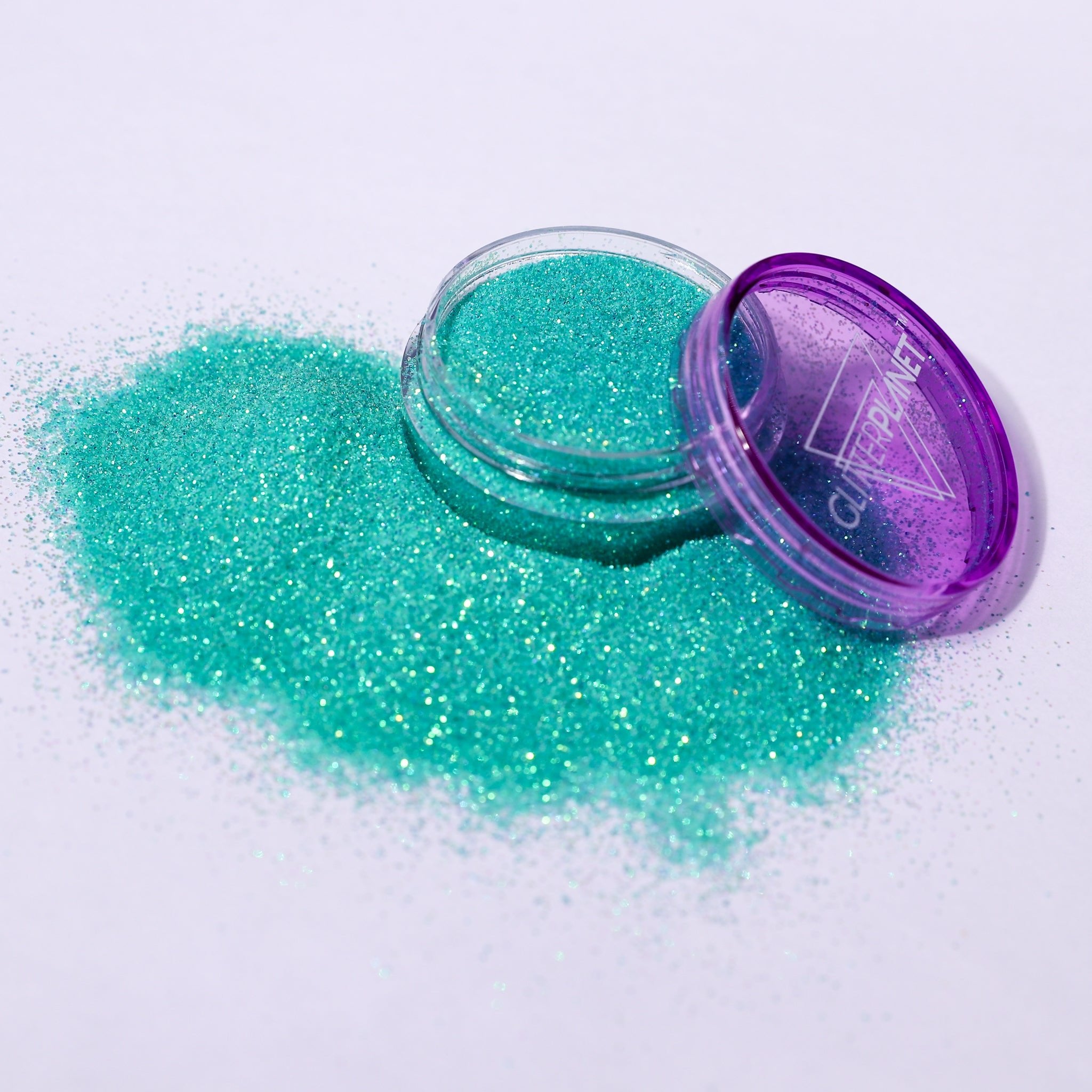 Paradise turquoise nail glitter in a pot branded with GLITTER PLANET