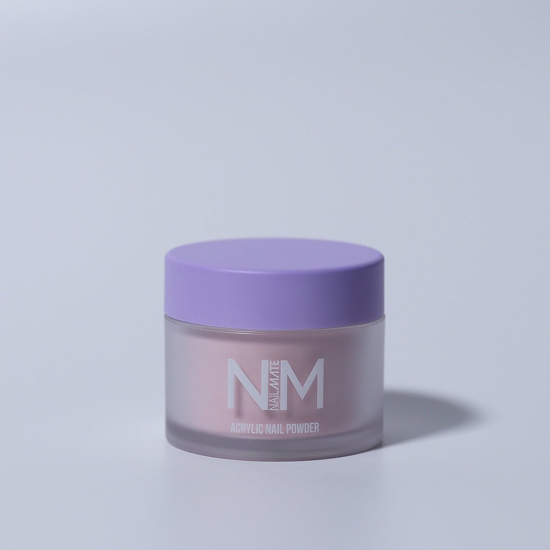 A jar of Perfect Pink acrylic nail powder with a purple lid, branded with the NM logo on a white background.