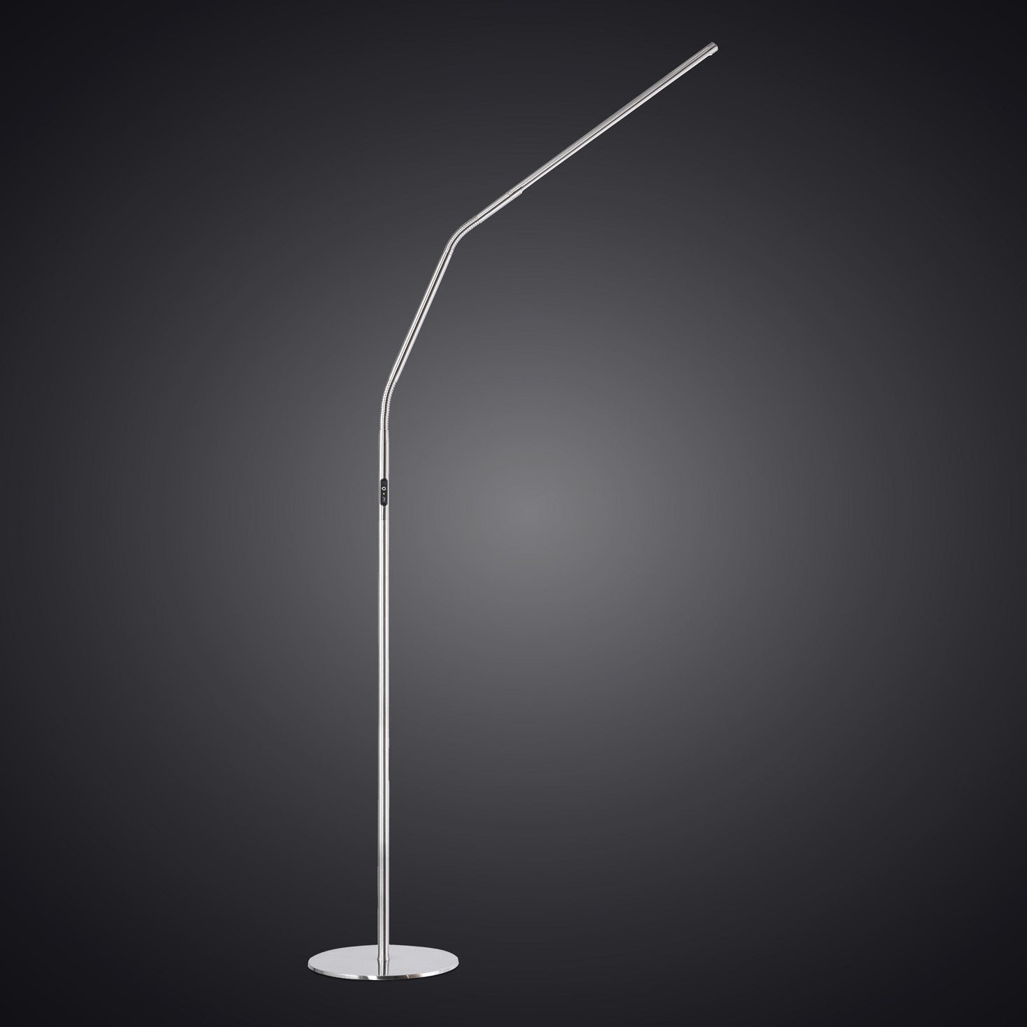 Modern floor lamp with a curved arm on a dark background