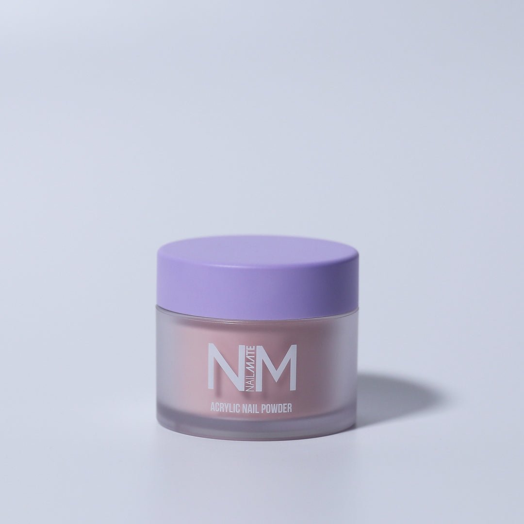 A jar of Classic Nude Acrylic Core powder for nails with a purple lid, labeled NM, against a white background.