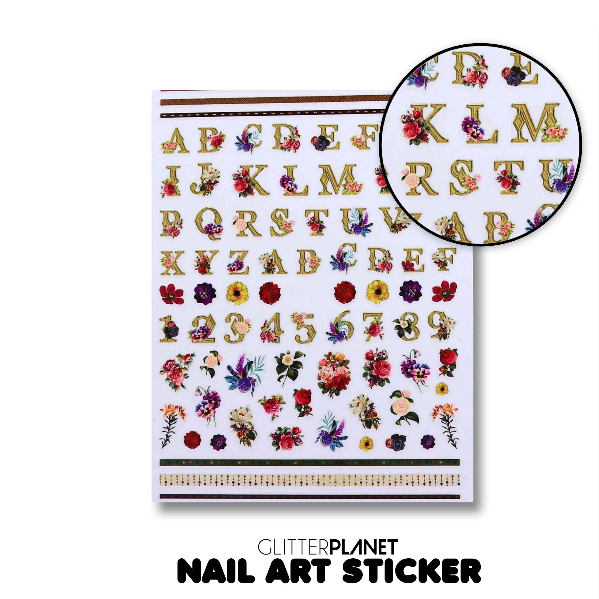 A sheet of self-adhesive nail art stickers featuring floral letters and numbers designs.