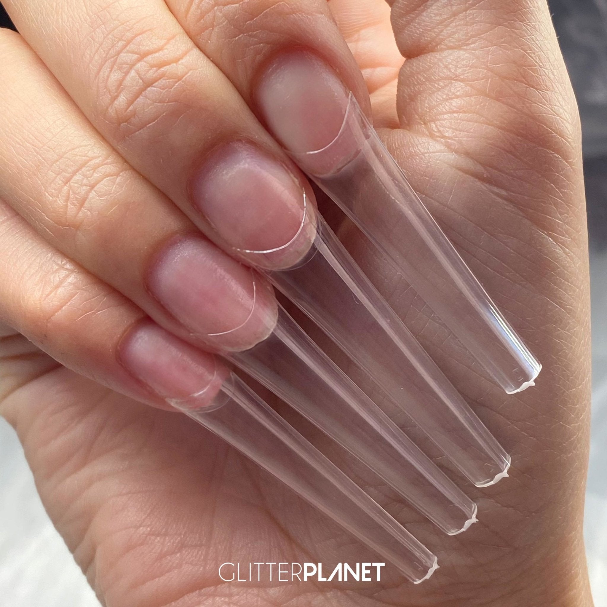 XXX Sculpt Tapered Coffin C Curve Nail Tips on the hand