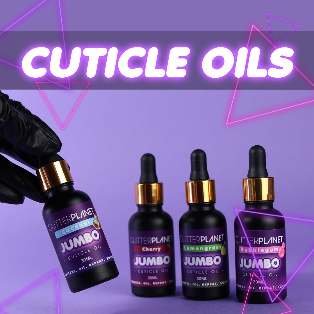 a hand holding a bottle of cuticle oil and 3 other bottles in the back on a lilac background