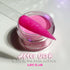 Pink acrylic powder with a Nail above a container labeled &