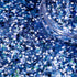 Blue glitter with a clear container on a blue background