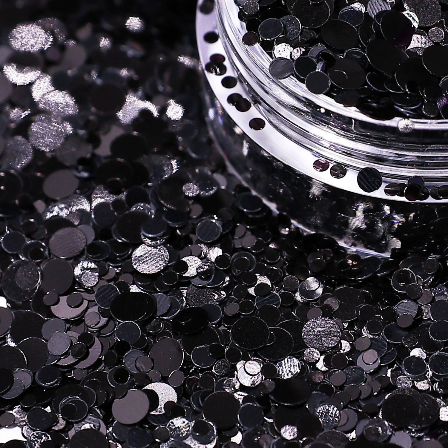 Black dot glitter on  with a clear container.