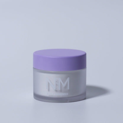 A jar of white acrylic nail powder with nail mate logo in white with a matte finish lilac lid. the jar in on a white backdrop  