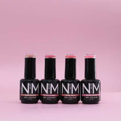 Four bottles of NM Brand gel nail polish in shades of pink, arranged in a row against a solid pink background.