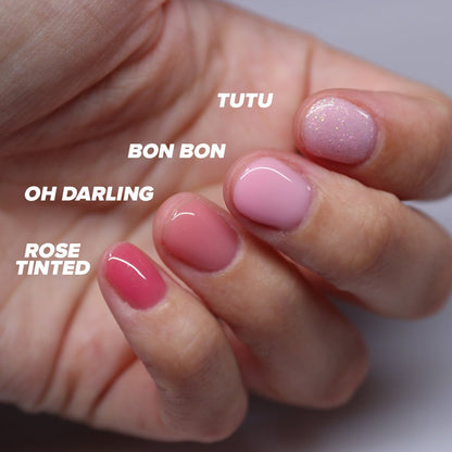 Bon Bon Pink Build+ Rubber Base Strengthening Builder Gel in a Bottle