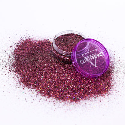 Purple glitter with a container labeled &
