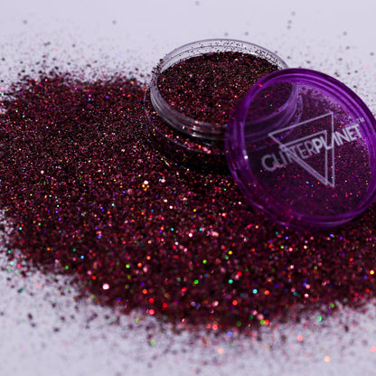 Purple glitter with a container labeled &