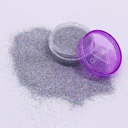Silver glitter with a purple container on a light gray background | Glitter Planet