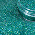 Turquoise glitter with a clear container 