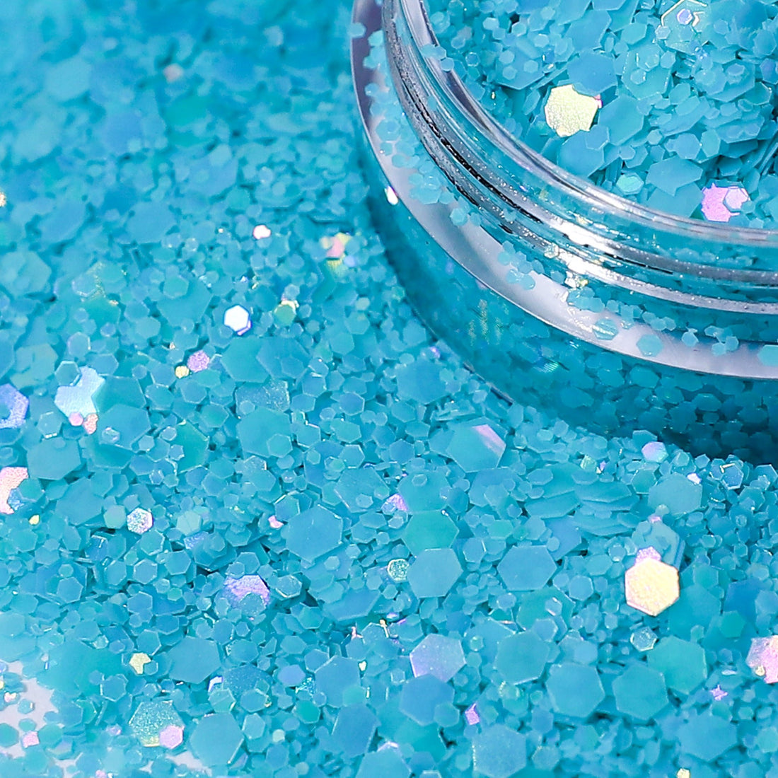 Turquoise glitter with a clear container partially filled with glitter