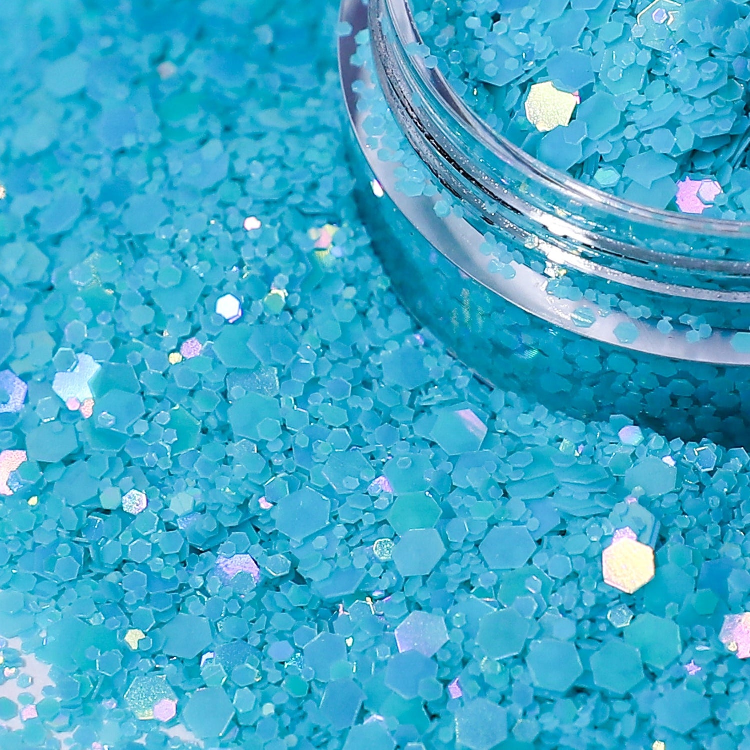 Turquoise glitter with a clear container partially filled with glitter