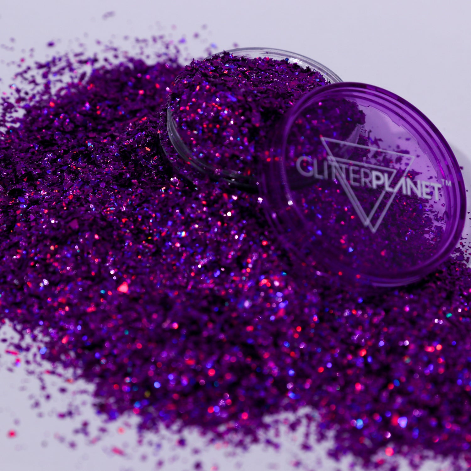 Purple glitter with a container labeled &