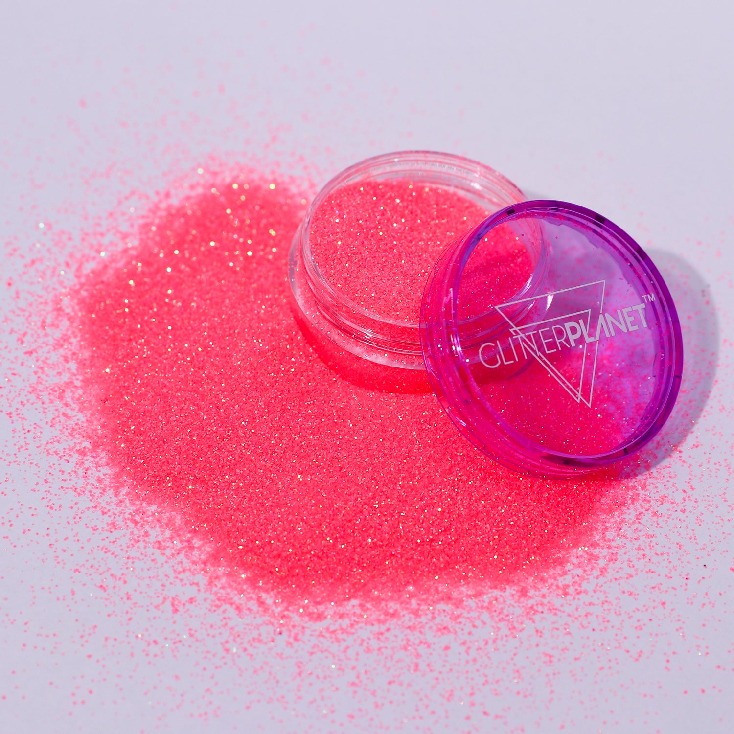 Coral glitter with a container labeled &