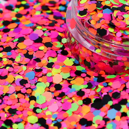 Colorful glitter with a clear container on a multicolored glitter background