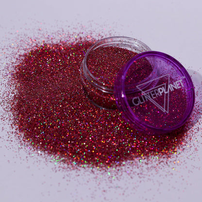 rose pink glitter container with open lid on a white background