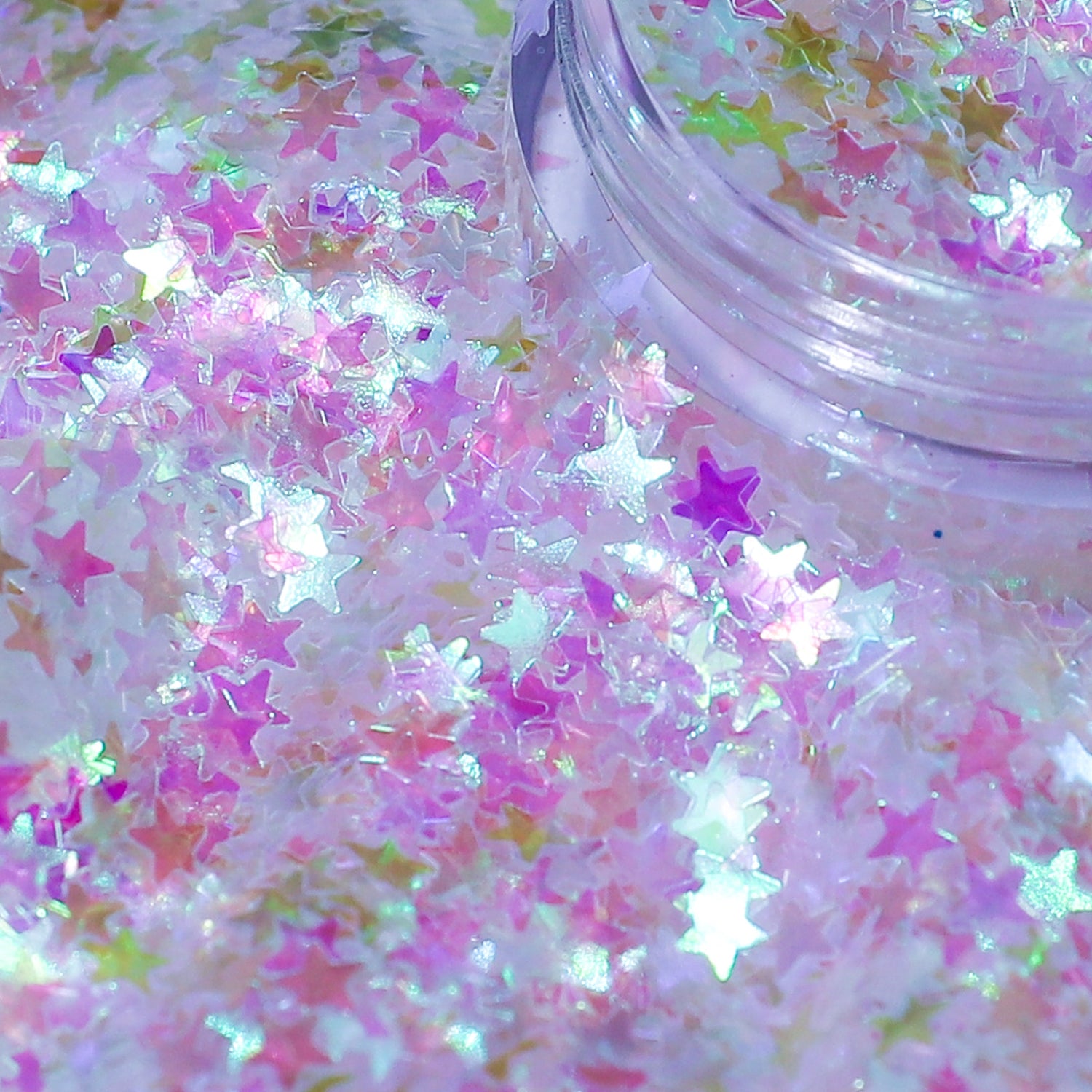 Star-shaped glitter in pastel colors with a clear container.