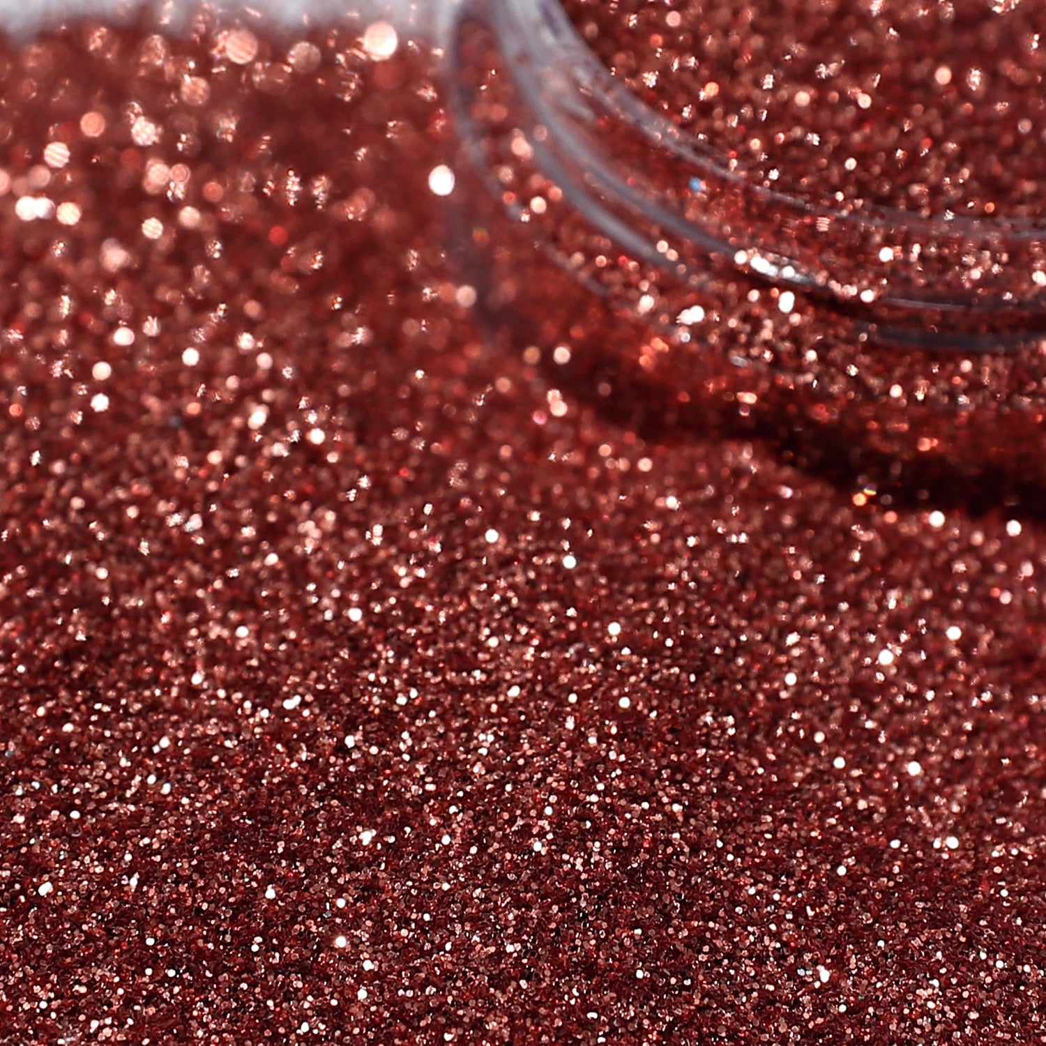 Close-up of caramel glitter with a clear container.