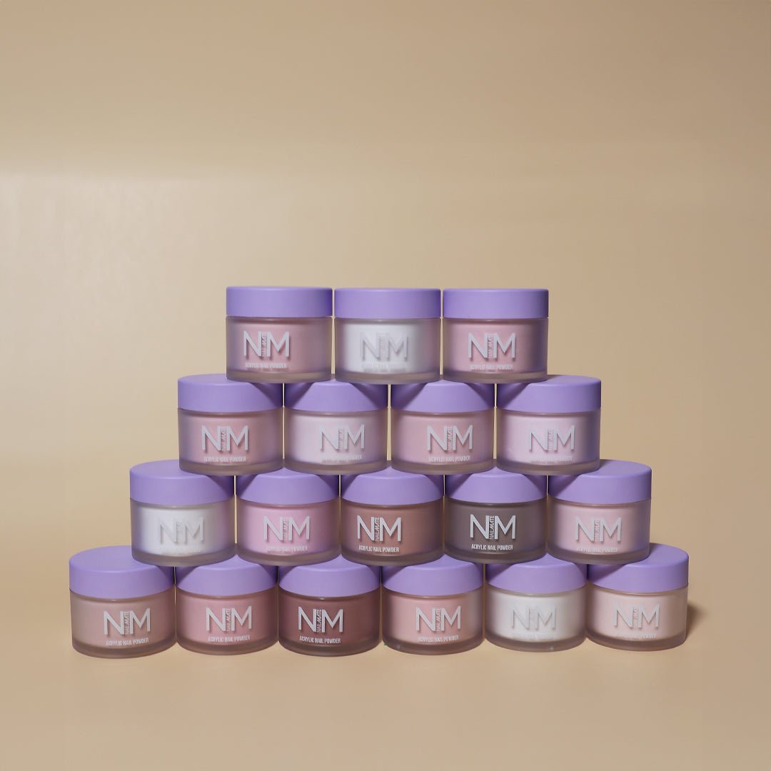 Stack of NM skincare jars on a beige background