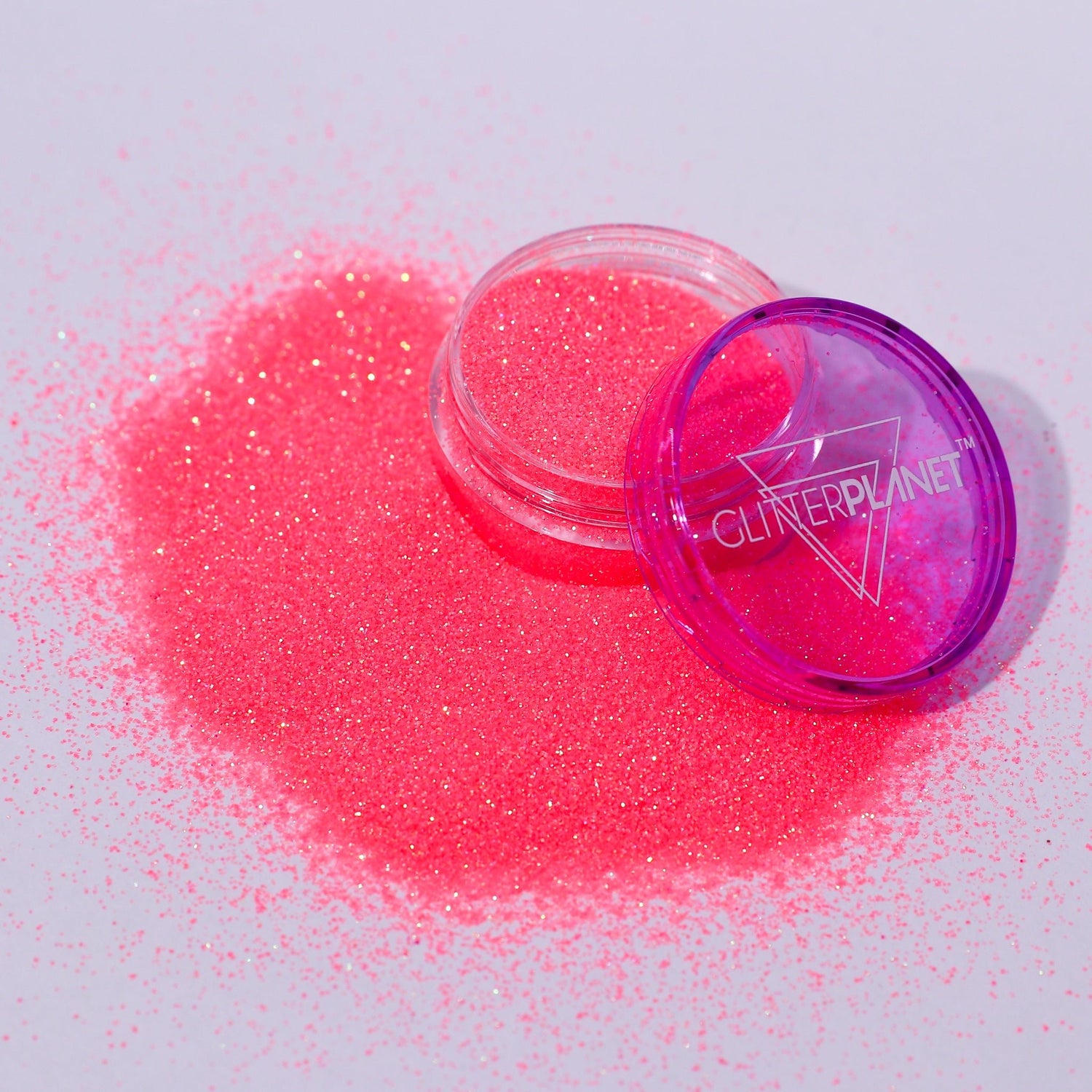 Coral glitter with a container labeled &