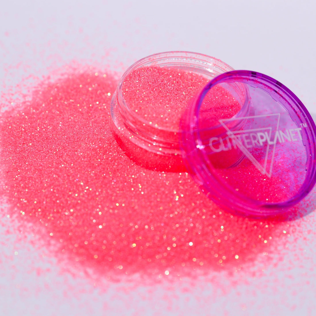 CORAL glitter with a container labeled &