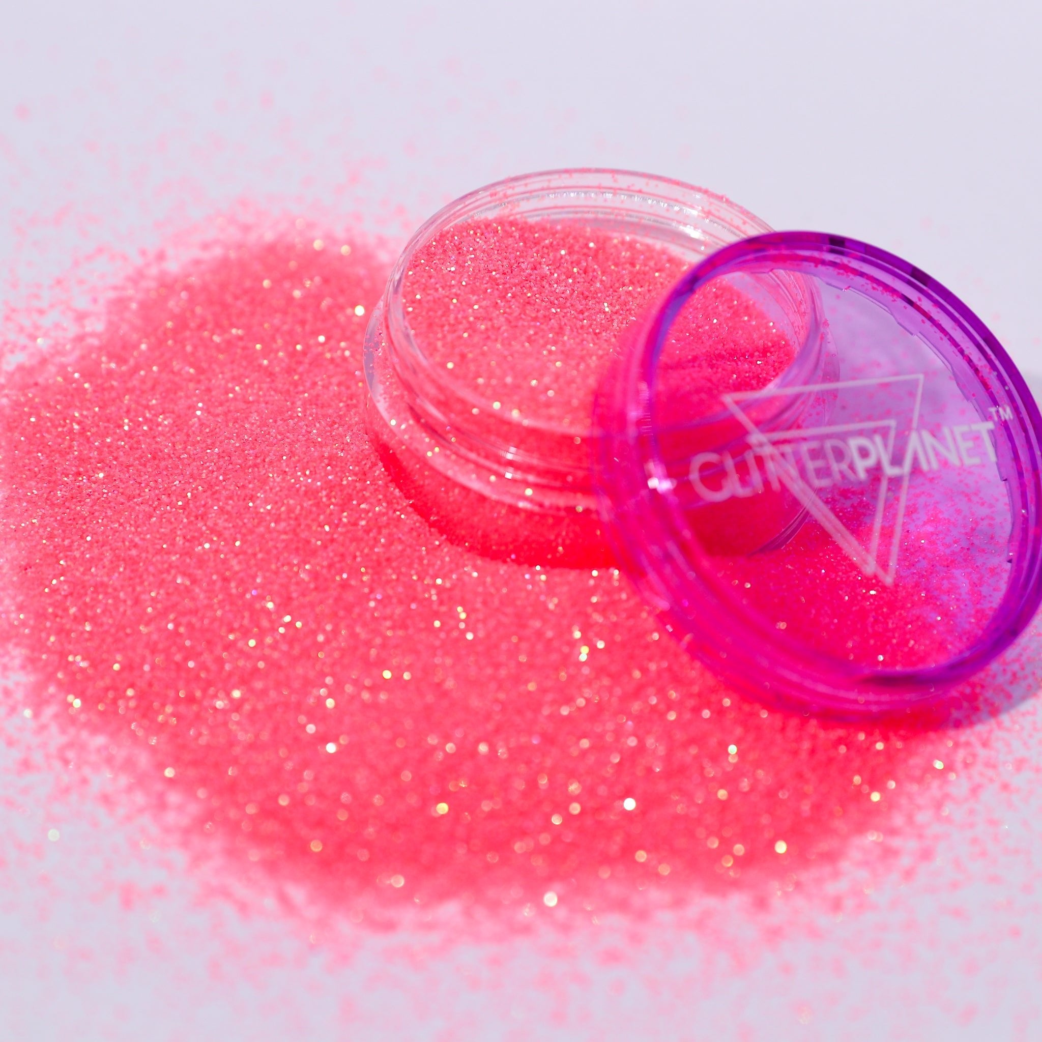 CORAL glitter with a container labeled &