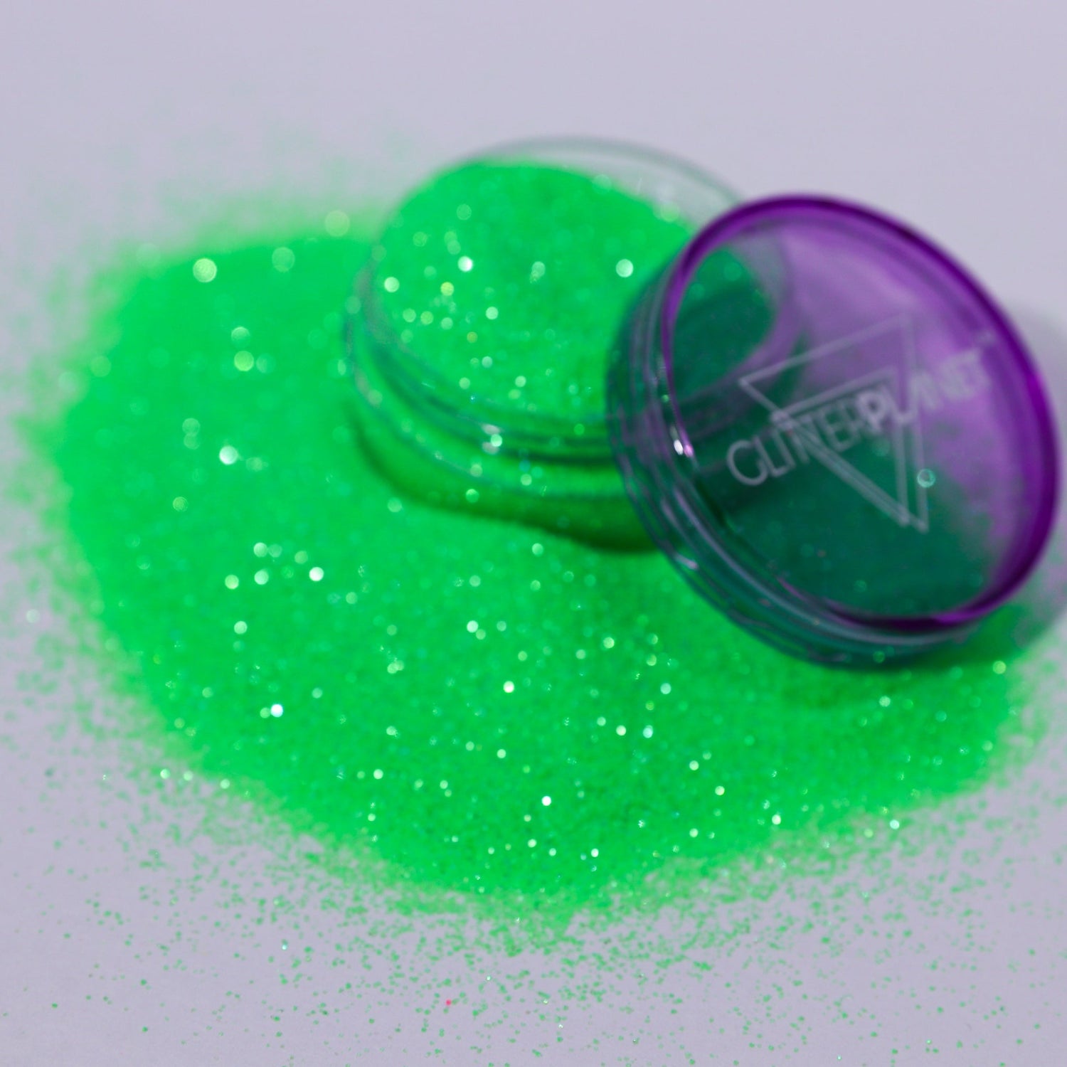 Green glitter with a container labeled &