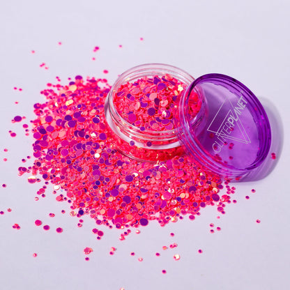 pink iridescent dot nail glitter on a white background