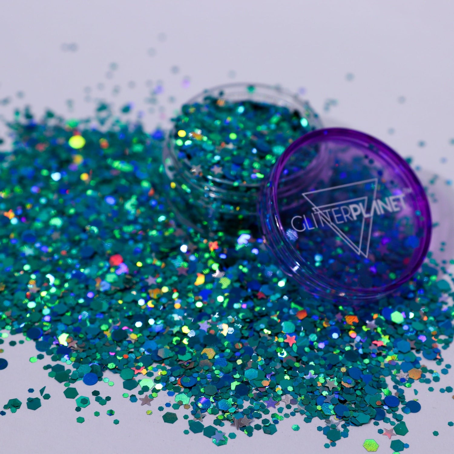 Turquoise glitter with a purple container labeled &