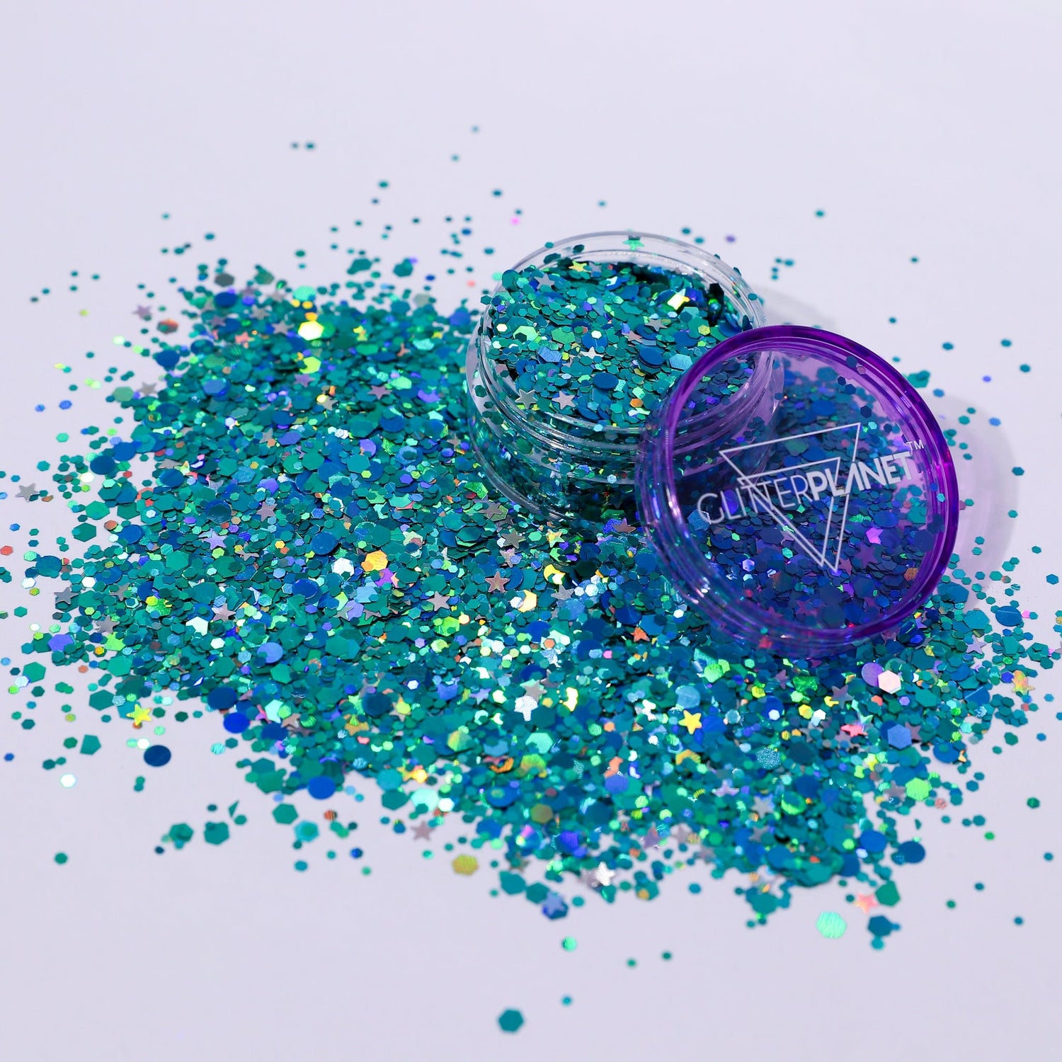 Turquoise glitter with a purple lid container on a white background