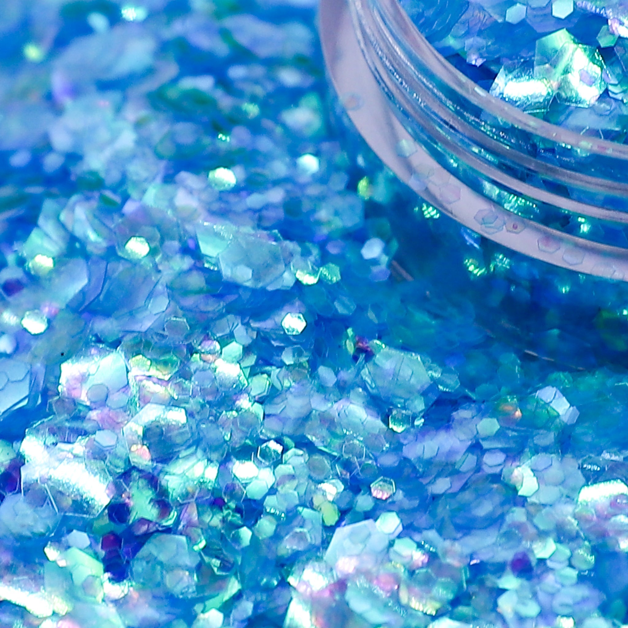 Blue glitter with a jar on a background