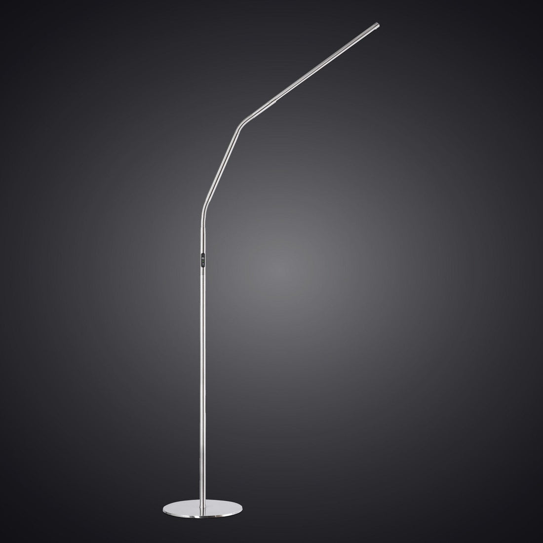 Modern floor lamp with a curved arm on a dark background