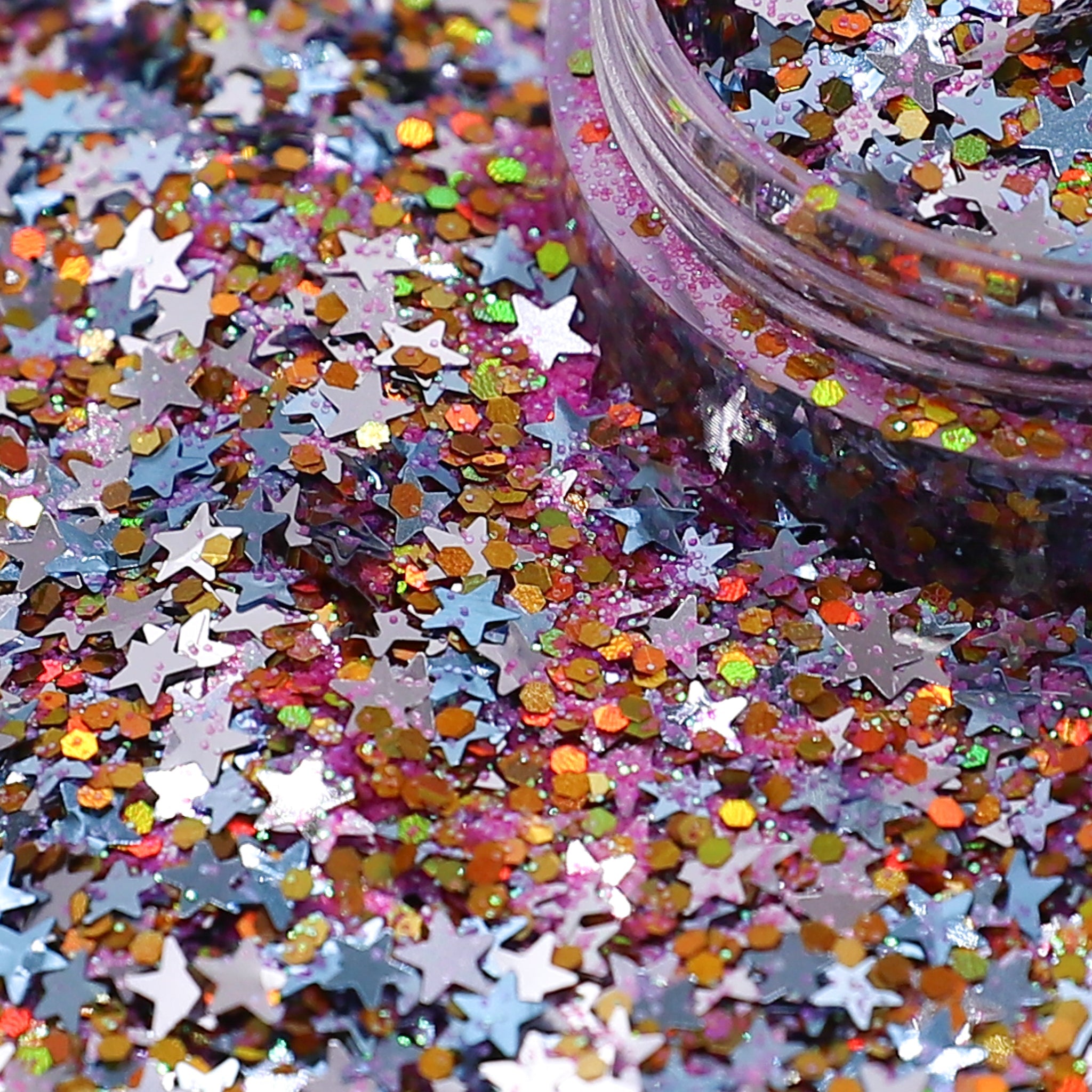 Star-shaped glitter in a jar with multicolor stars on a glittery background