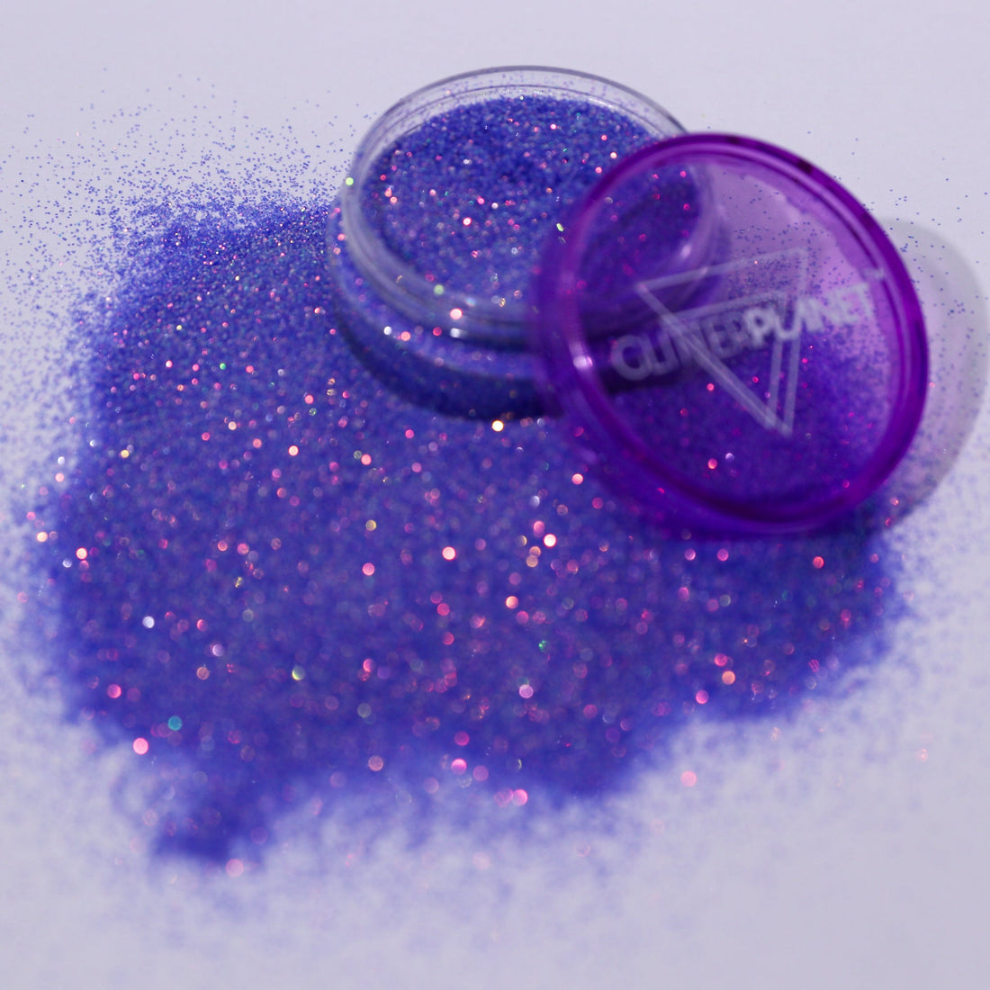 Purple glitter with a container labeled &