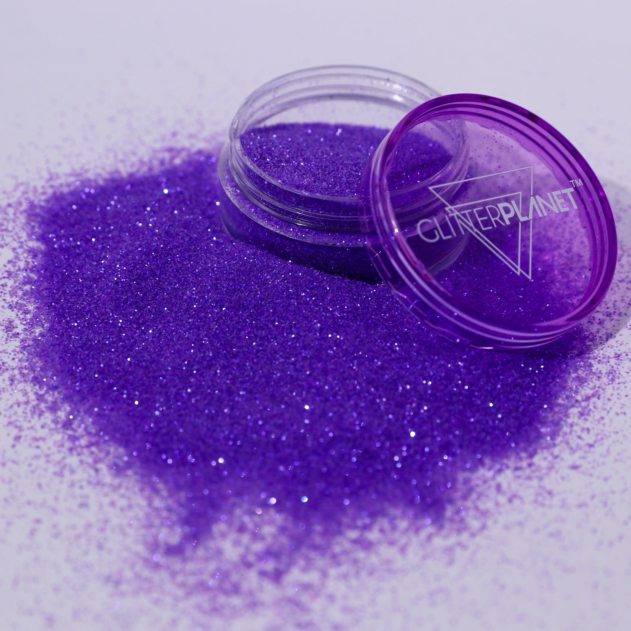 Purple glitter with a container labeled &
