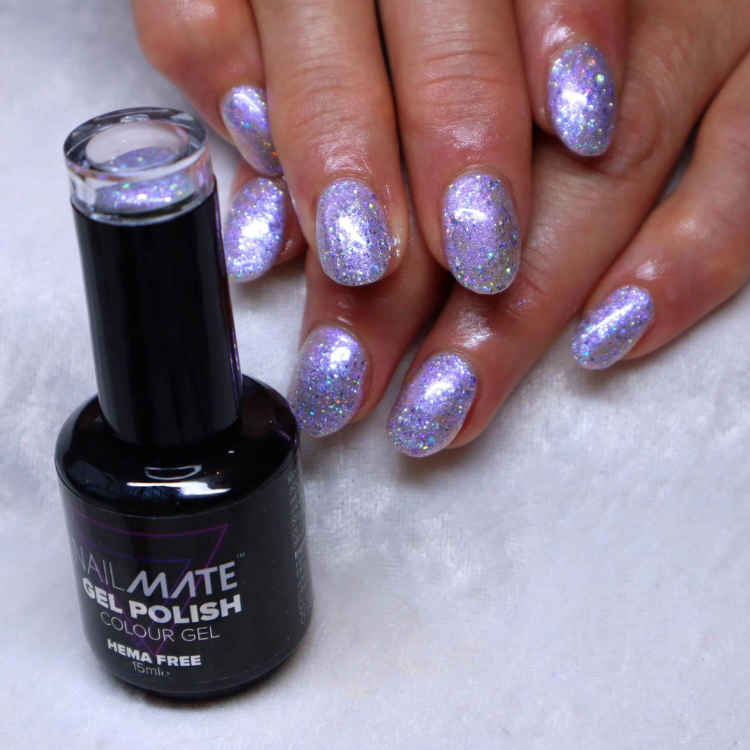 Glitter blue iridescent Pearl gel nail polish on nails